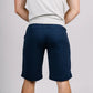 Navy blue knee-length athletic shorts with patented carrier retention waistband