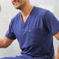 Navy blue Men’s Double-Pocket Scrub Top featuring a stylish V-neck design