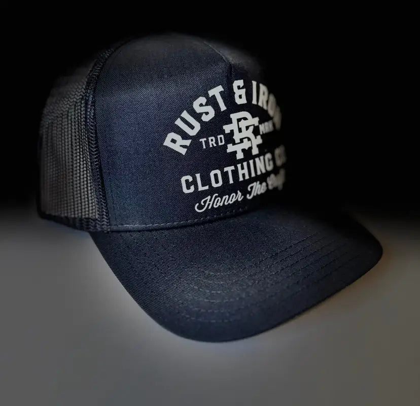 Navy blue trucker hat with Rust & Iron Clothing logo for the Traditional Logo Dirtbag