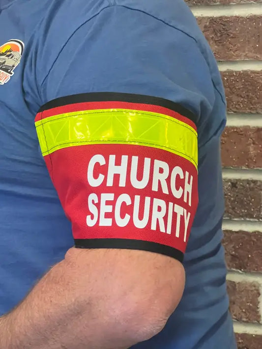 Navy blue Church Security armband with reflective yellow stripes and red patch