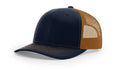 Navy and brown trucker hat with Serpent Skull Leather Patch and Skull Leather Patch