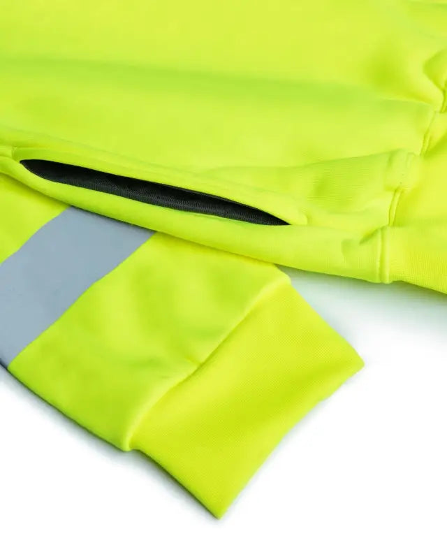 Neon yellow sleeve of UHV544 Soft Shell HiVis 1/4 Zip Jacket with reflective stripe