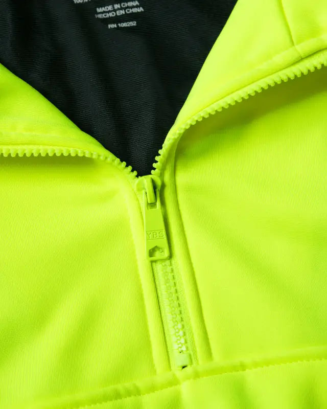 Neon yellow zipper detail on UPA542 HiVis 1/4 Zip Soft Shell Pullover