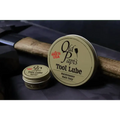 Metal tin of Old Papi’s Tool Lube showcasing the product label and secret sauce features