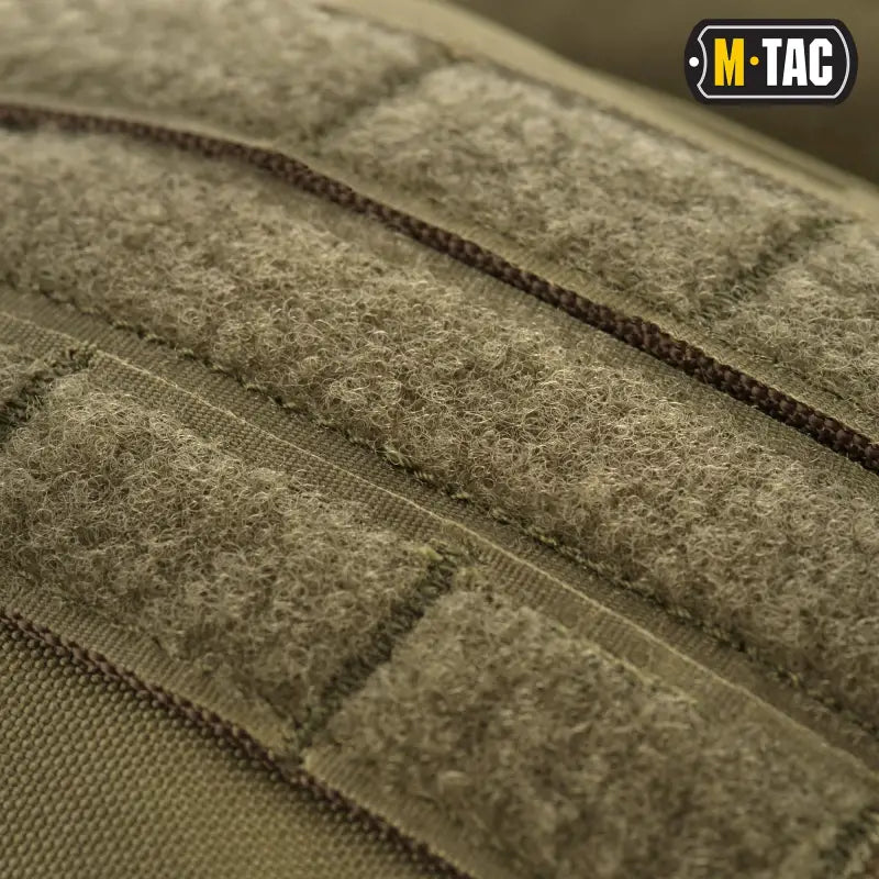 Olive tactical MOLLE webbing with hook-and-loop, featured in M-Tac Assault Pack