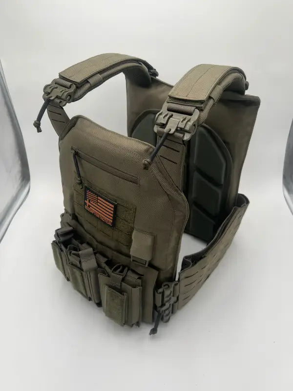 Olive drab large size body armor with modular plate carrier and magazine pouches