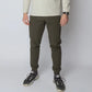 Olive green athletic joggers with concealed carry and carrier retention waistband for travelers
