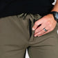 Olive green athletic pants from Carrier Shorts Mk.II featuring concealed carry suitable for Arrowhead Tactical Apparel