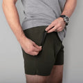 Olive green carrier training shorts with 5-inch inseam for concealed carry training