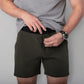 Olive green carrier training shorts with 5-inch inseam for concealed carry trening purposes