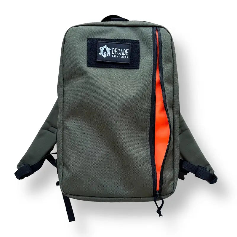 Olive green 24hr Ranger Green Backpack with orange zipper and black logo patch