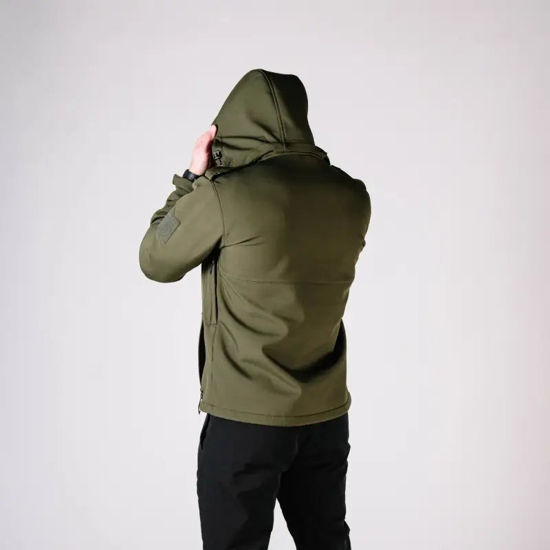 Olive green Tactical Jacket Alpha with hood and convenient hand pocket for outdoor wear