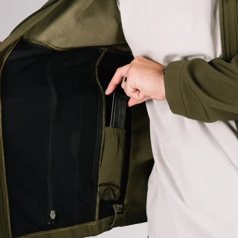 Olive green Tactical Jacket Bravo with interior hand pocket for outdoor activities