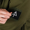 Olive green Tactical Jacket Alpha with patch and convenient hand pocket for outdoor use