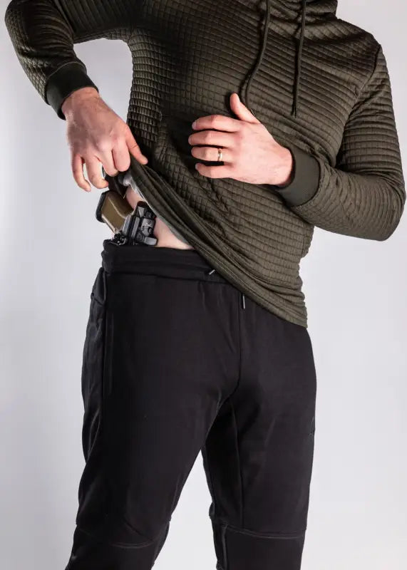 Olive green ribbed hoodie styled with Carrier Joggers Mk.II featuring patented carrier retention