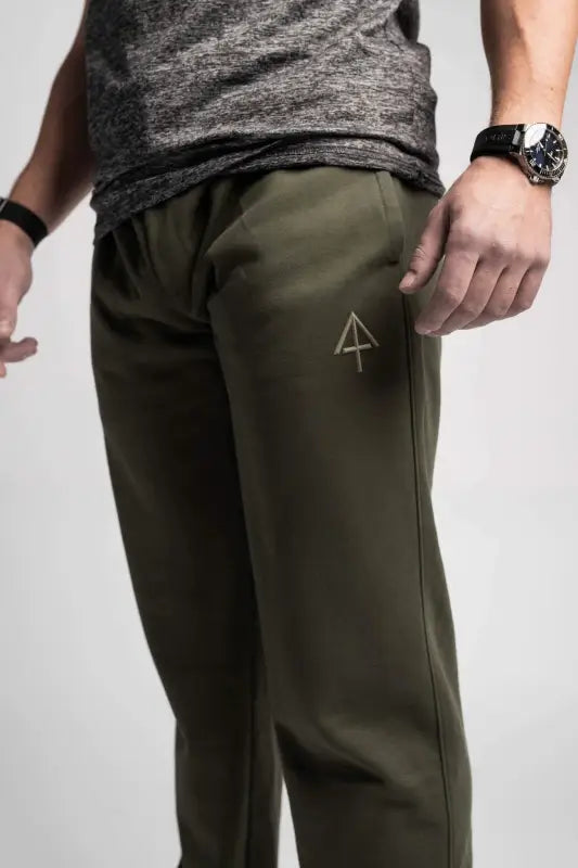 Olive green Carrier Sweatpants featuring patented carrier retention waistband and triangle logo