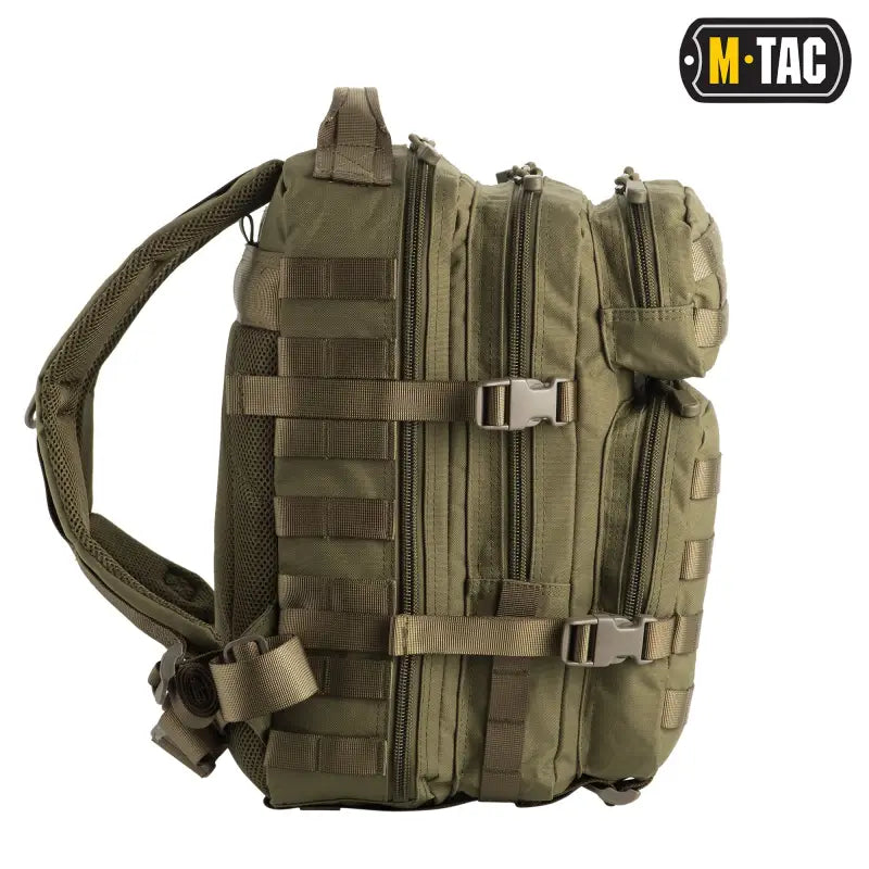 Olive green M-Tac Assault Pack with MOLLE webbing and large zippered compartments