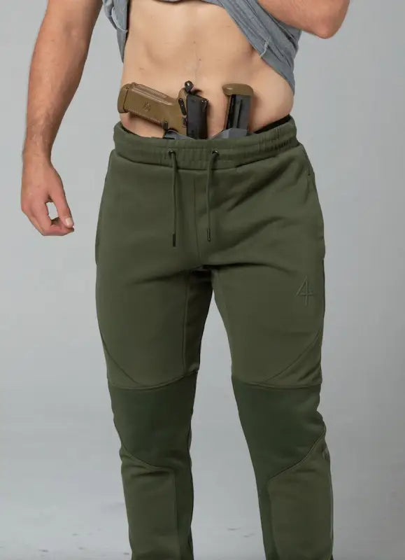 Olive green Carrier Joggers Mk.II featuring patented carrier retention waistband for concealed carry