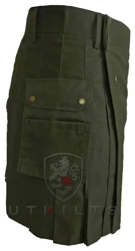 Olive Green Utility Kilt featuring cargo pockets and an embroidered shield patch