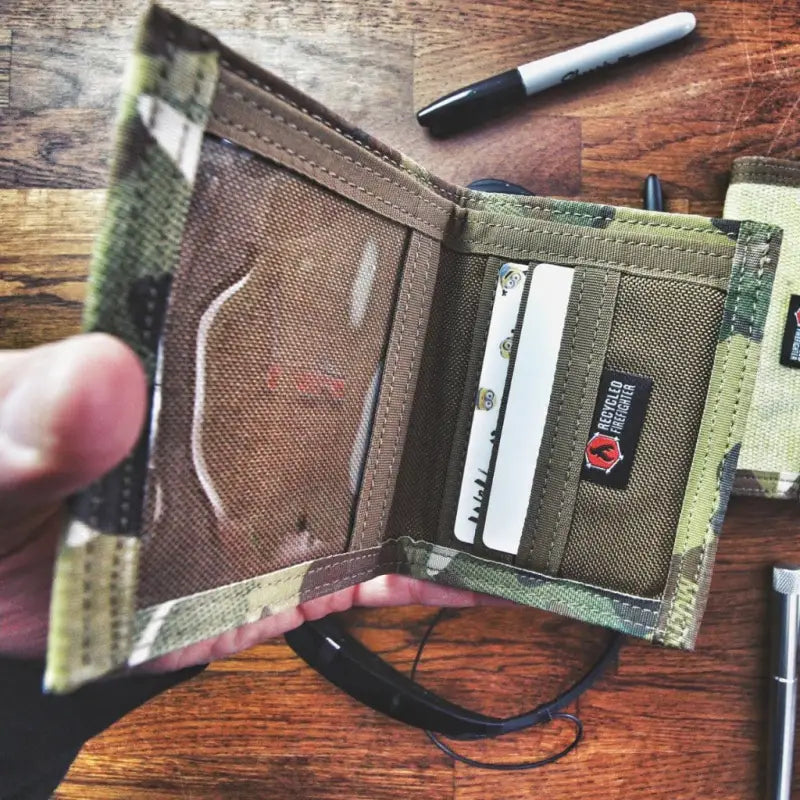 Olive green tactical wallet with card slots in Coyote Combat Leather design