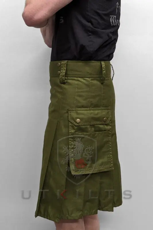 Olive green utility kilt featuring cargo pockets and pleats for practicality and style