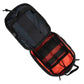 Open black MOLLE Pouch with red compartments, ideal for trauma or gunshot bag use