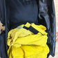 Open black Wildland Fire Gear Bag 2 Compartment with suede leather wrap and yellow clothing