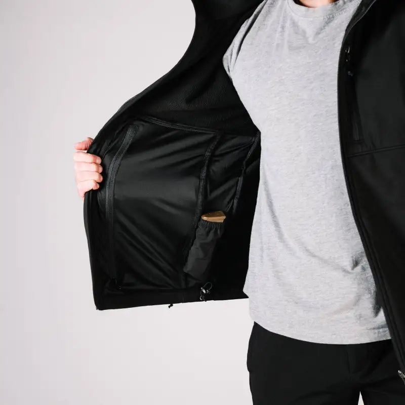 Open Tactical Jacket Bravo revealing interior hand pocket for versatile storage