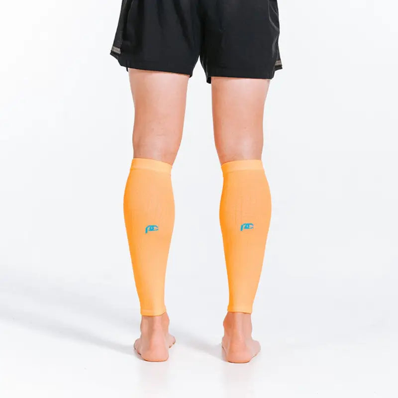 Orange calf compression sleeves with blue logos for ultimate support and style