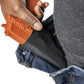 Orange holster on blue jeans showcasing Asset Tactical Jeans for superior functionality