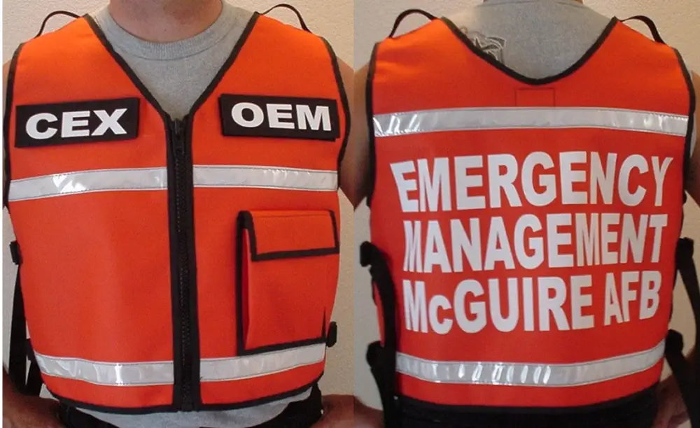 Orange emergency response reflective vest with CEX OEM and EMERGENCY MANAGEMENT McGUIRE AFB