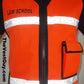 Orange emergency response reflective vest with LAW SCHOOL text and reflective stripes