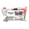 Outer Limit Supply bleeding control kit with rolled gauze in red and white packaging