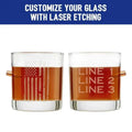 Two laser-etched patriotic rocks glasses featuring an American flag and text designs