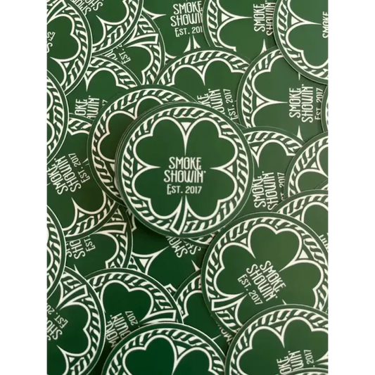 Repeating pattern of green shamrock smoke showin stickers with Smoke Showin Est 2017