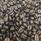 Dark roasted coffee beans from One-Eyed Jack Blend naturally grown for rich flavor