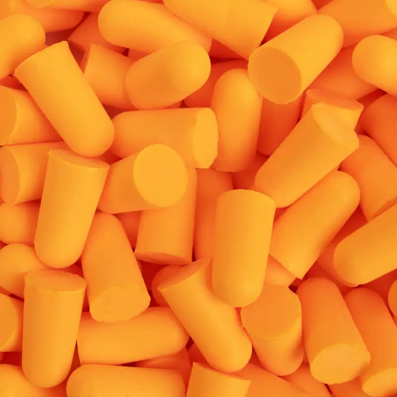 Pile of orange foam earplugs refill for 32dB NRR Soft Foam Earplugs Dispenser