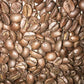 Pile of roasted bourbon infused coffee beans from Costa Rica for Bourbon Infused Coffee product