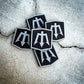 Pile of Trident-Emblazoned PVC Patches for Firefighter and First Responder Gear
