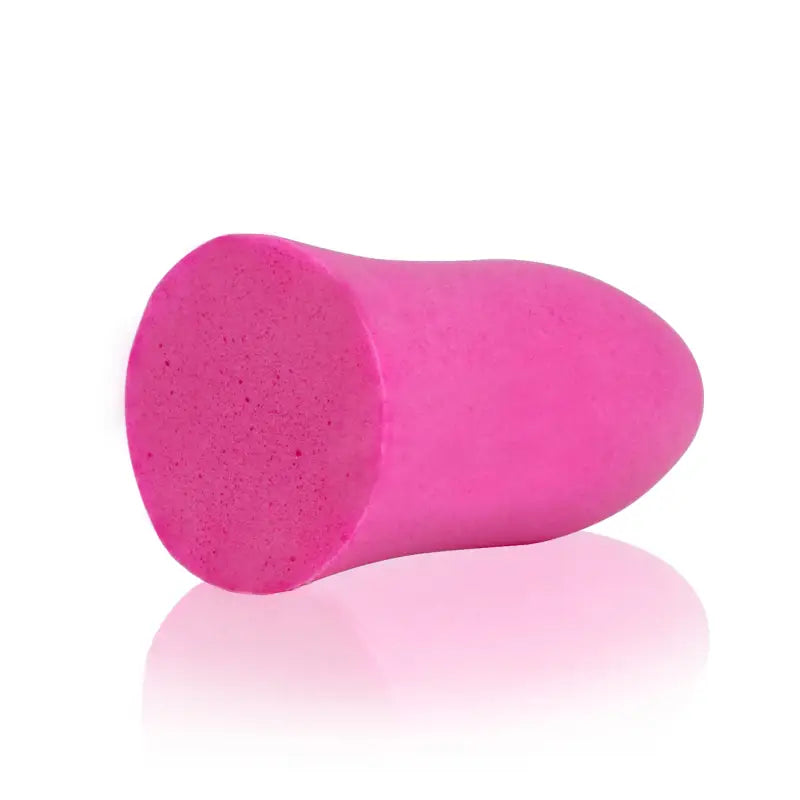 Pink foam makeup sponge beside 31dB NRR Bell-Shaped Soft Foam Earplugs packaging