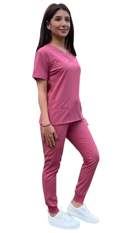 Pink Women’s 4-Way Extreme Stretch Jogger Scrubs - style ST100-JR in matching top and pants