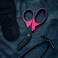 Pink trauma shears with black titanium coated stainless blades for emergency providers