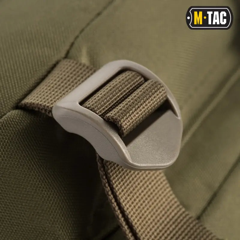 Plastic buckle with olive webbing strap for M-Tac Assault Pack’s large compartments