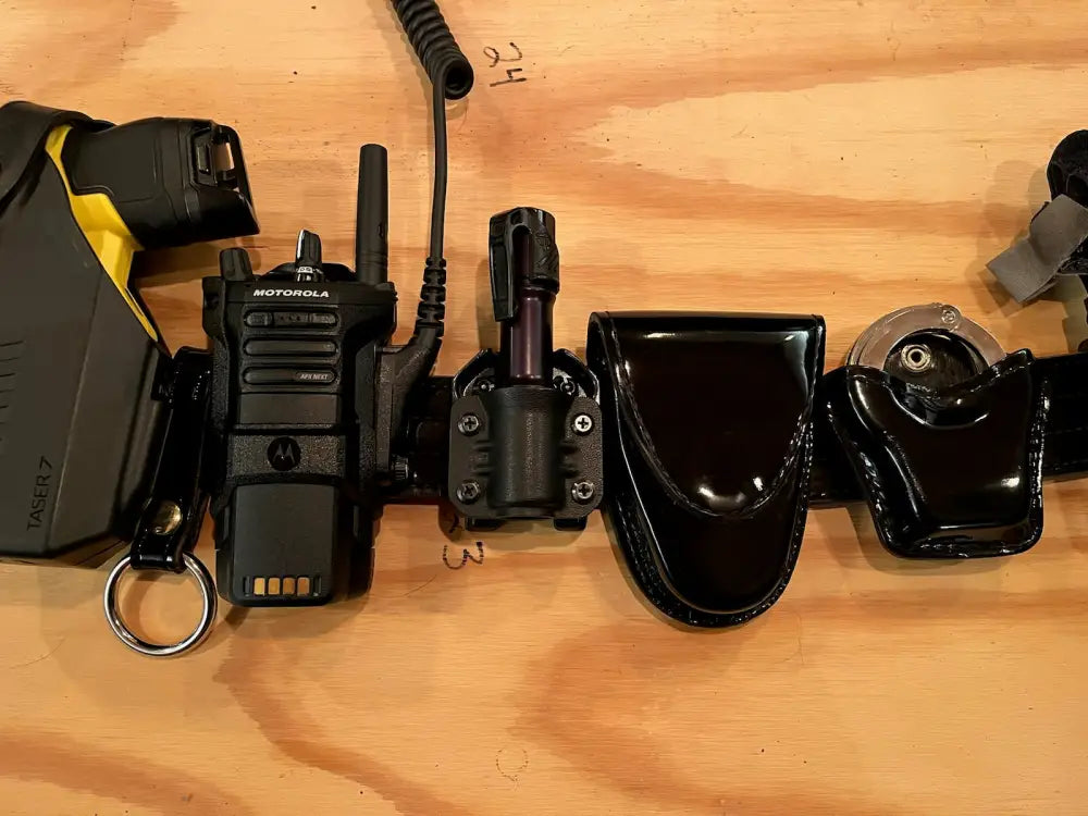 Police duty belt with cloud defensive MCH-HC flashlight carrier and equipment