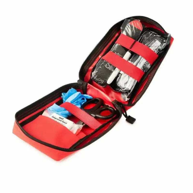 Red Scherber Public Access Bleeding Control Kit with organized medical supplies