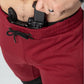 Red Carrier Joggers Mk.II with black accents and patented carrier retention waistband