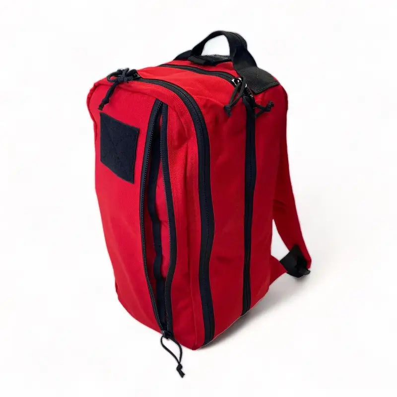 Red backpack with black trim and zippers from 12HR Plus Royal Blue collection