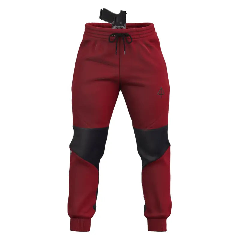 Red and black Carrier Joggers Mk.II with concealed carry gun in waistband for carrier retention