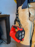 Red and black LED flashlight on a carabiner for Box Light Clip product