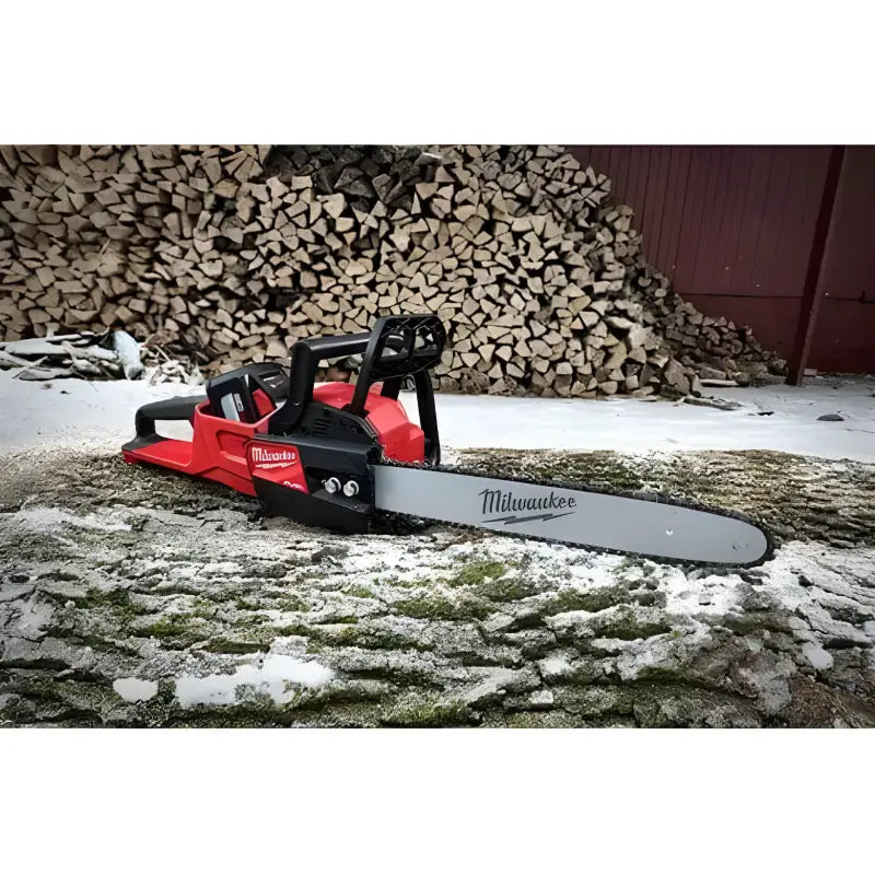 Red and black Milwaukee 2727-20C M18 FUEL™ 14’’ Chainsaw with silver chain bar